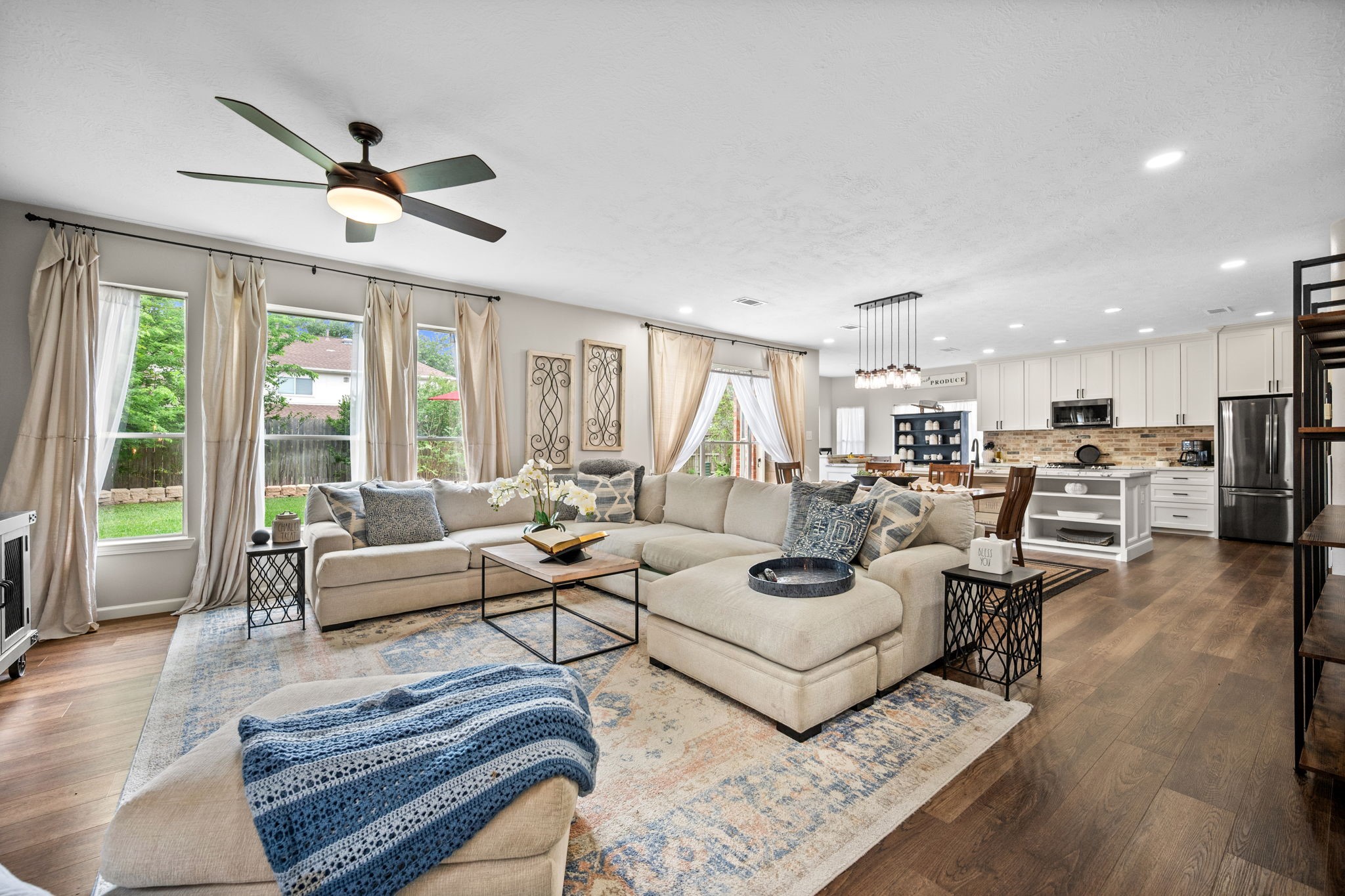 814 Legend Spring Drive Katy, TX 77494 - Photo 29 of 30 Welcome HOME to 814 Legend Spring Drive, boasting a reimagined open floorplan with upscale finishes nestled within the heart of Heritage Square, q quiet hidden gem of a neighborhood known for its quiet streets, mature trees, and convenient location. This 4 bedroom home offers the perfect blend of modern aesthetics with the charm a location can only build over time.