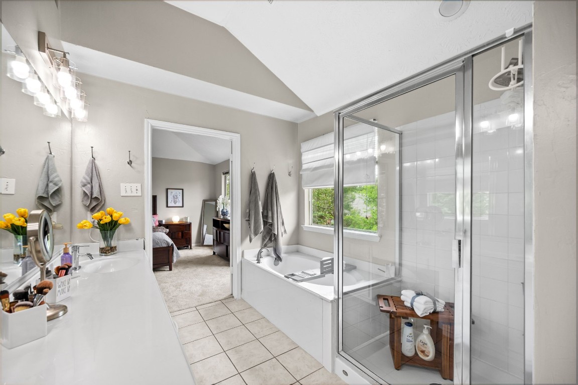 814 Legend Spring Drive Katy, TX 77494 - Photo 18 of 30 The primary bath is light, bright, and impeccably maintained, as you have come to expect after seeing the rest of the home.