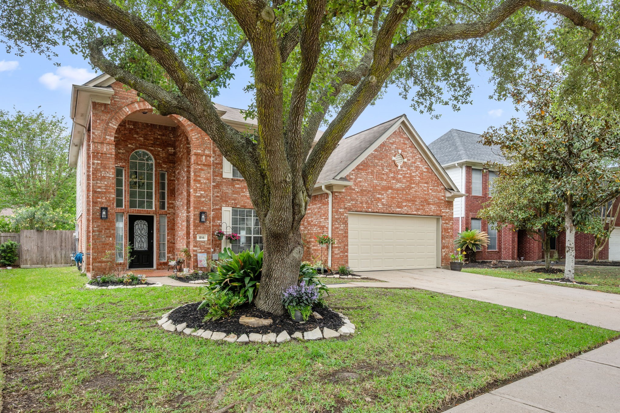 814 Legend Spring Drive Katy, TX 77494 - Photo 2 of 30 Mature trees are a hallmark of a well-established neighborhood. The tree-lined streets of Heritage Square provide a peaceful backdrop for this well-maintained home. Boasting 4 bedrooms, 2.5 baths, and an open concept first floor layout, this home is move-in ready.