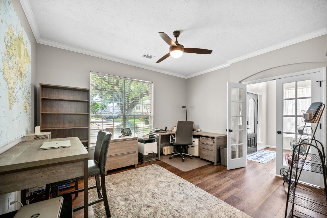 814 Legend Spring Drive Katy, TX 77494 - Photo 5 of 30 As you enter the home, you will see the dedicated home office to your right. Overlooking the front yard, this flexible space could fulfill a variety of space planning needs, from office to secondary living area to home gym. The possibilities are endless! Don't miss the storage space under the stairs in here!