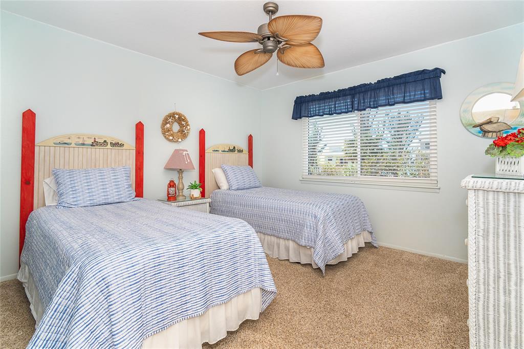 290 South Gulf Boulevard, Unit 31 Placida, FL 33946 - Photo 29 of 63 a bedroom with bed and a window