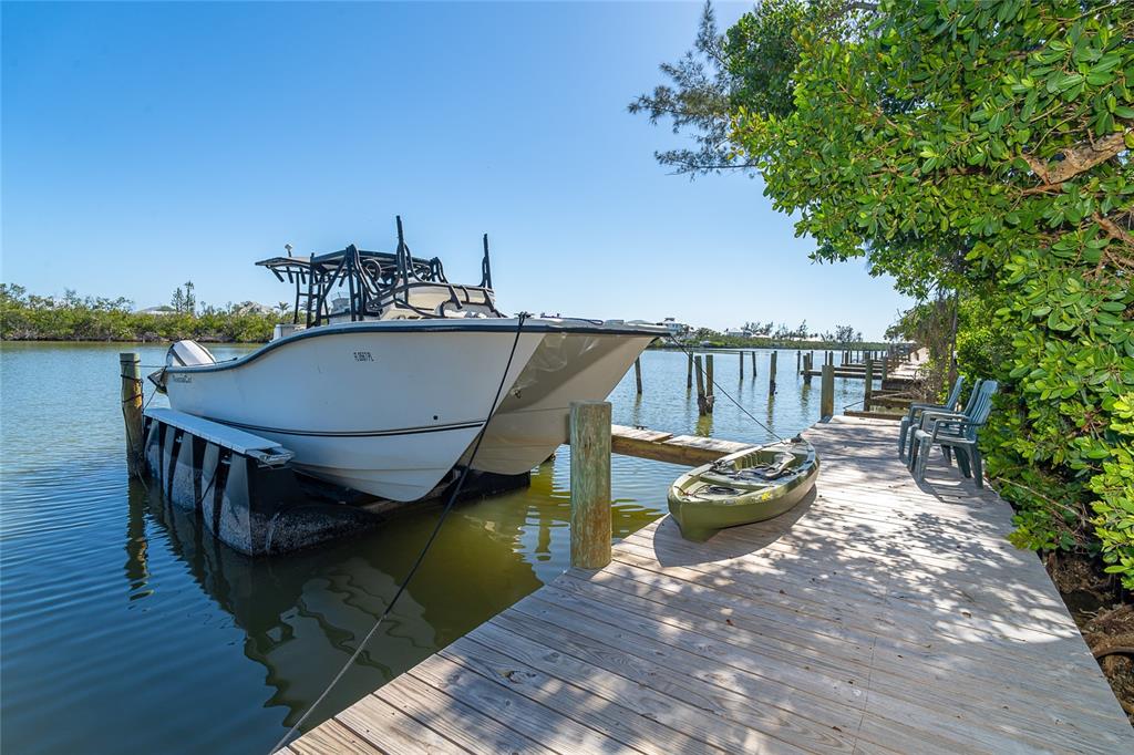 290 South Gulf Boulevard, Unit 31 Placida, FL 33946 - Photo 41 of 63 a view of a roof deck with couches