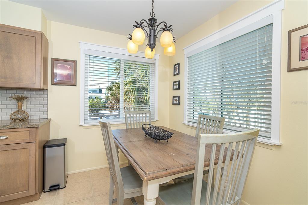 290 South Gulf Boulevard, Unit 31 Placida, FL 33946 - Photo 8 of 63 a view of a dining room with furniture window and outside view