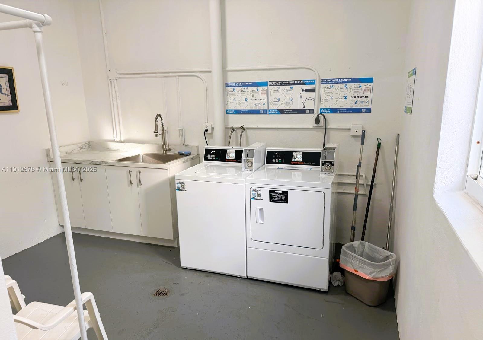 1818 Rodman Street, Unit 4D Hollywood, FL 33020 - Photo 8 of 8 a utility room with dryer and washer