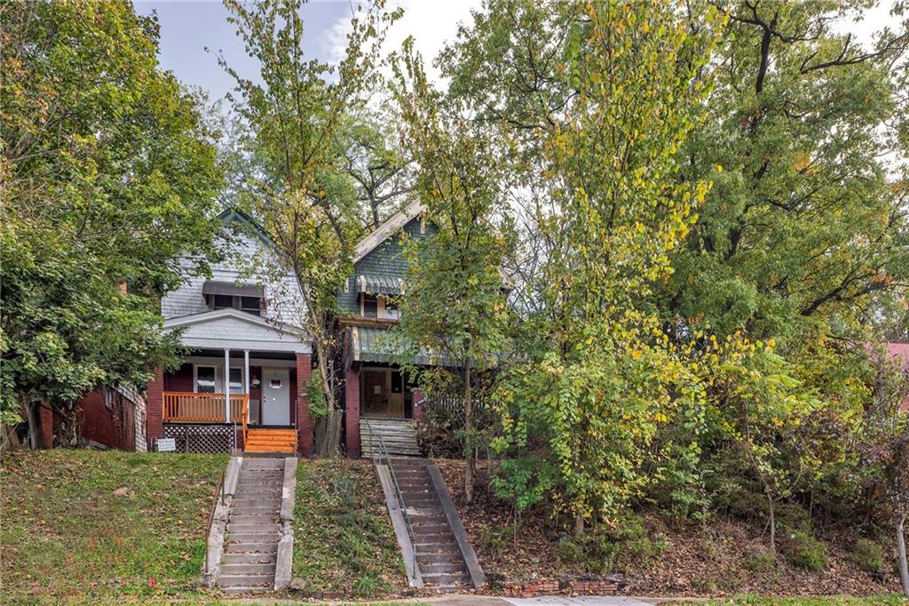 2040 Laketon Road Pittsburgh, PA 15221 - Photo 2 of 26 a front view of a house with garden