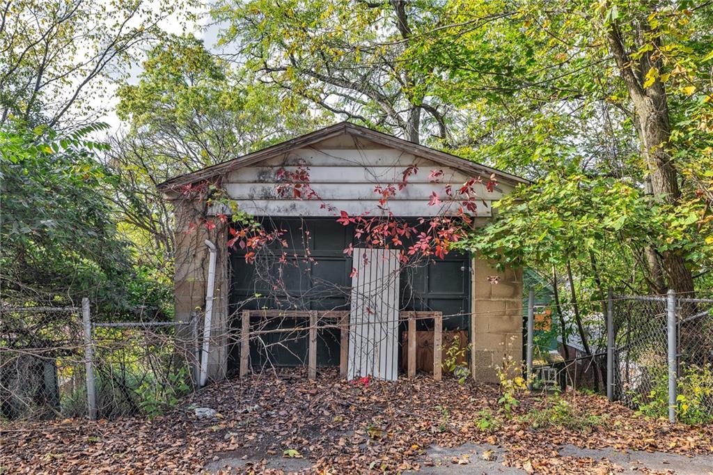 2040 Laketon Road Pittsburgh, PA 15221 - Photo 25 of 26 a front view of a house with plants