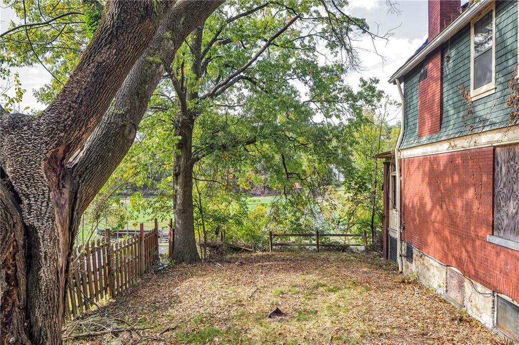 2040 Laketon Road Pittsburgh, PA 15221 - Photo 26 of 26 a view of a yard with plants and trees