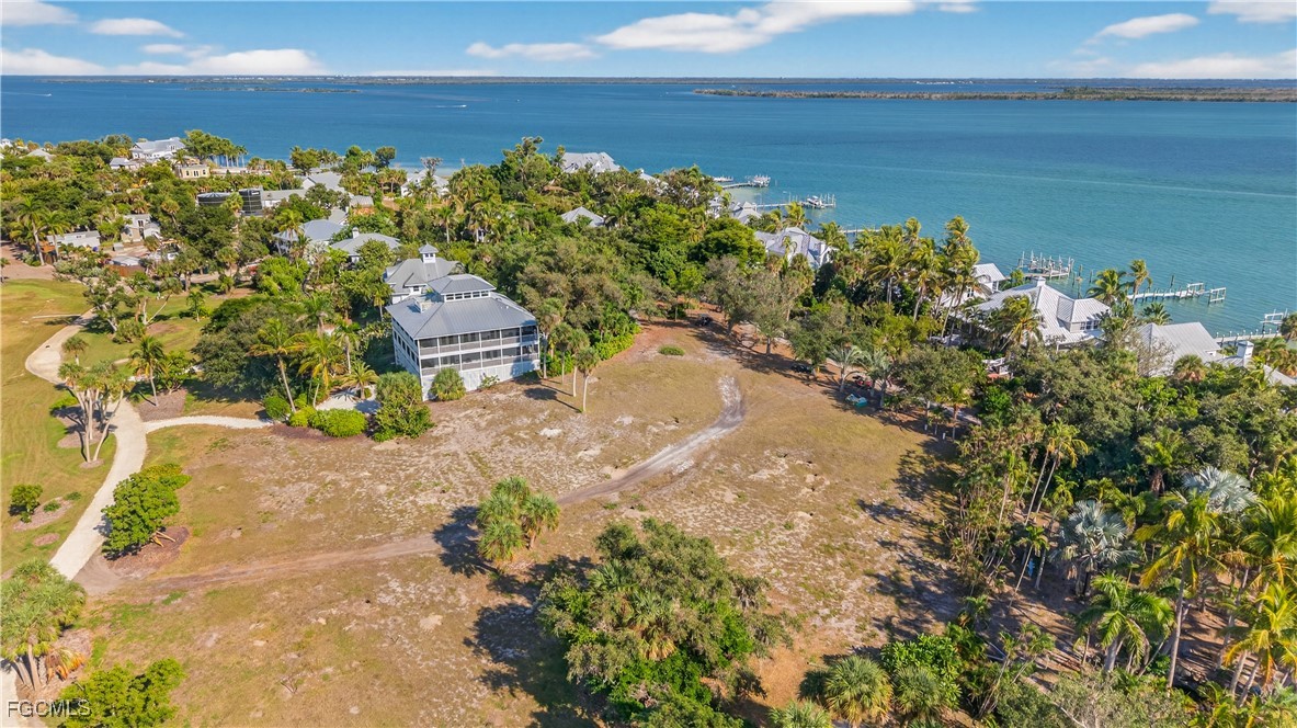 326 Useppa Useppa Island Bokeelia, FL 33922 - Photo 11 of 20 a view of a garden with an ocean view
