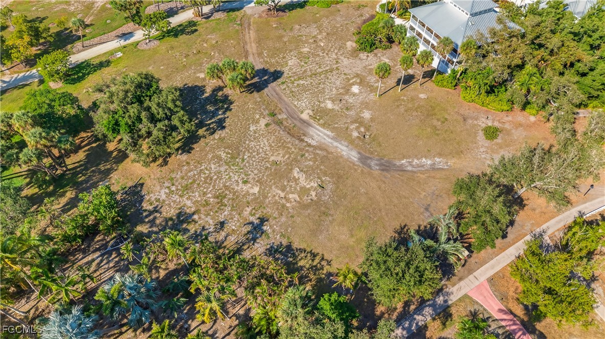 326 Useppa Useppa Island Bokeelia, FL 33922 - Photo 17 of 20 a view of a tree with a yard