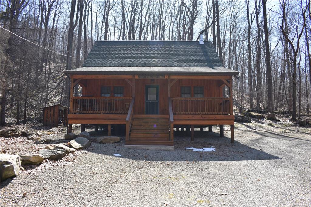 155 Rock Run Road Rector, PA 15677 - Photo 17 of 23 Ample parking spaces and large porch provide plenty of room for guests