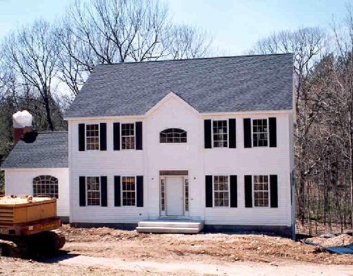1 River Run Road Newtown, CT 06470 - Photo 1 of 1 a front view of a house with a yard