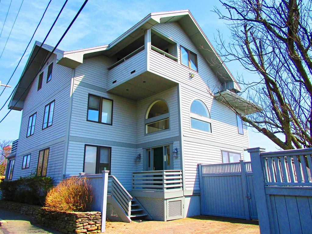 a front view of a house with a garage