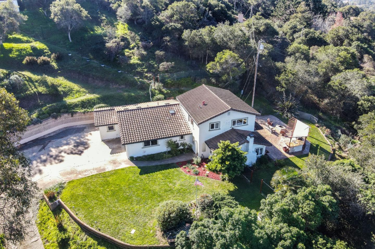 17920 Berta Canyon Road Salinas, CA 93907 - Photo 1 of 36 an aerial view of a house with swimming pool and outdoor seating