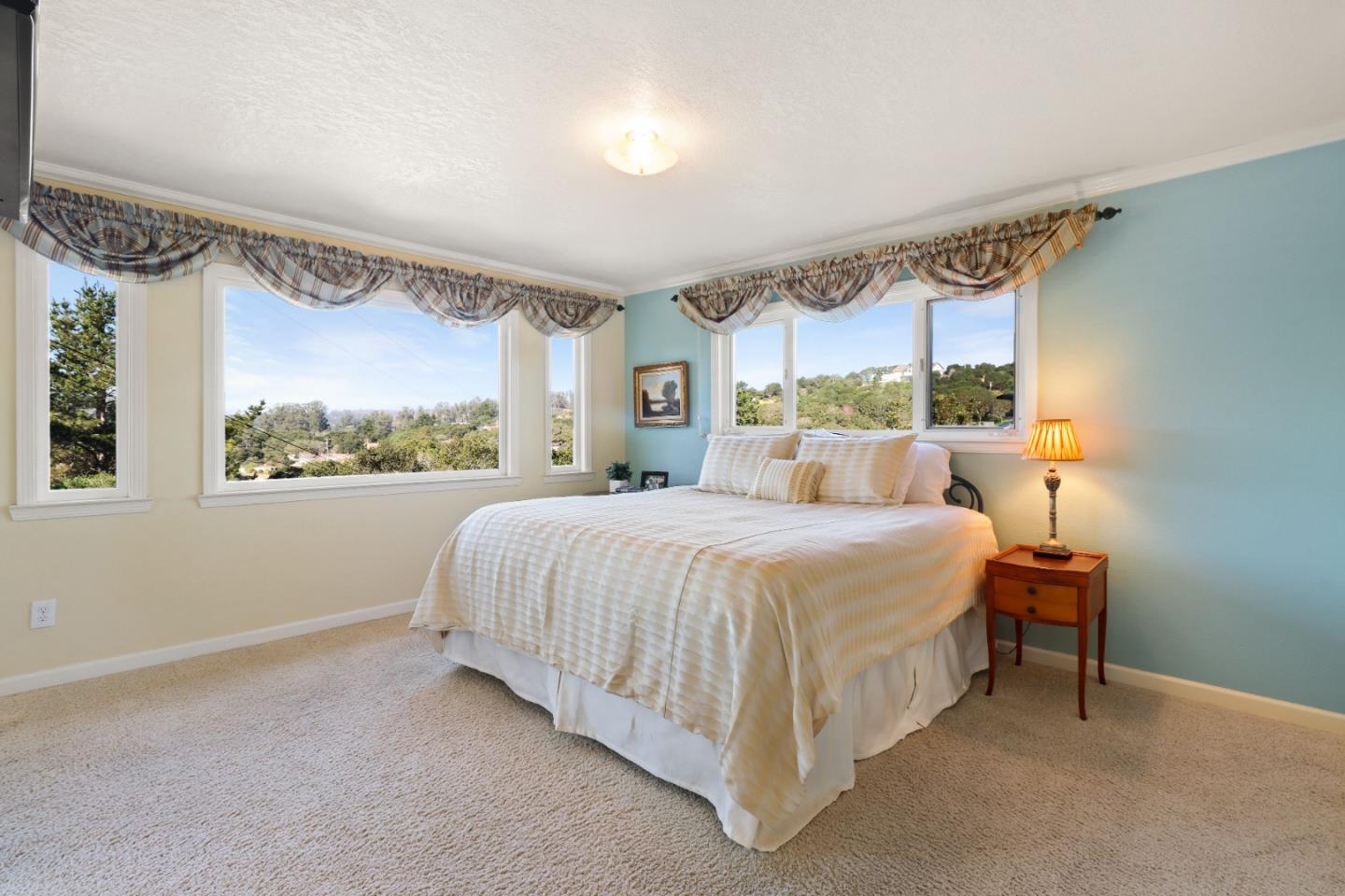 17920 Berta Canyon Road Salinas, CA 93907 - Photo 18 of 36 a bed room with a bed and a window
