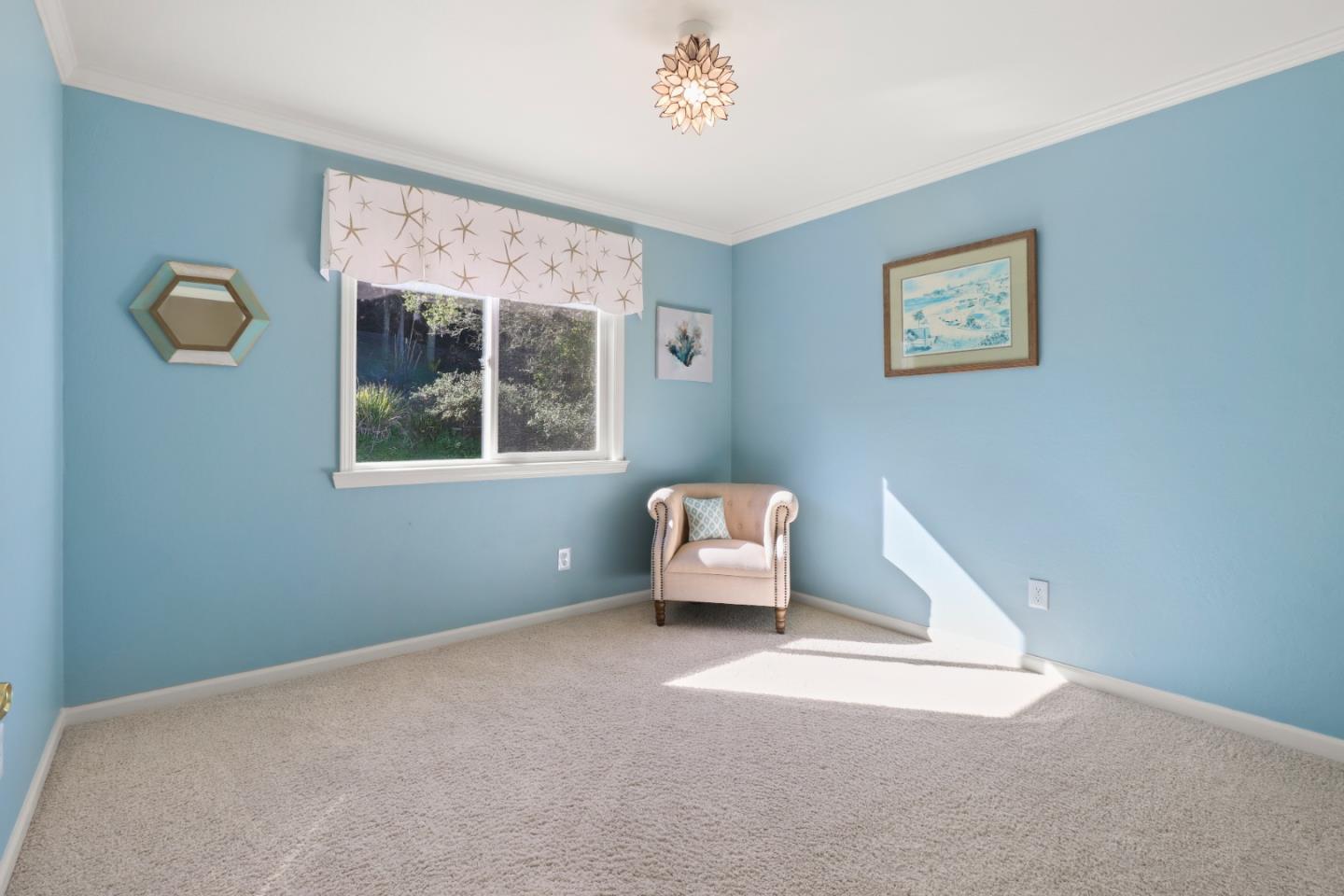 17920 Berta Canyon Road Salinas, CA 93907 - Photo 21 of 36 a bedroom with a bed and window