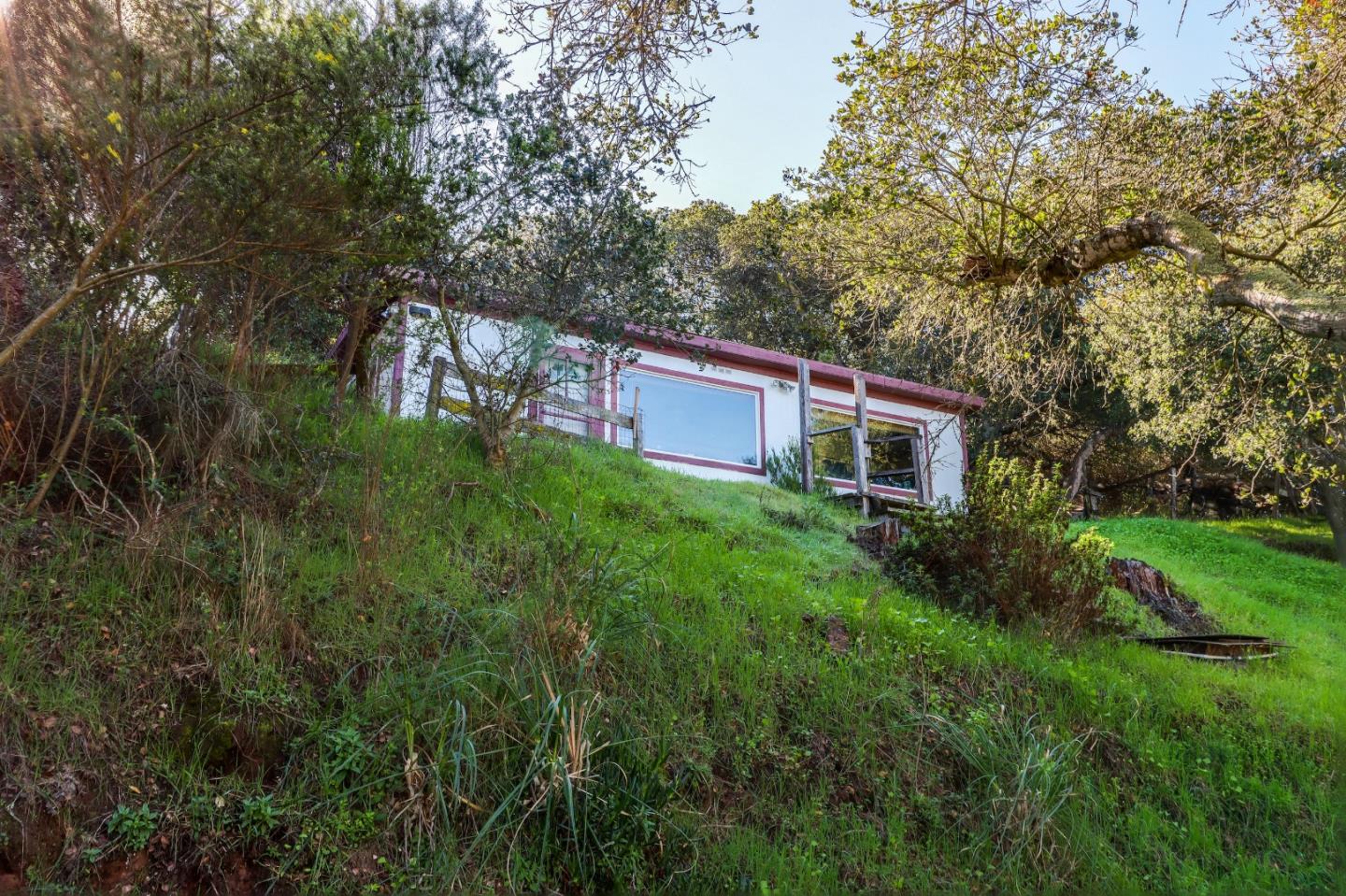 17920 Berta Canyon Road Salinas, CA 93907 - Photo 30 of 36 a view of a house with a yard