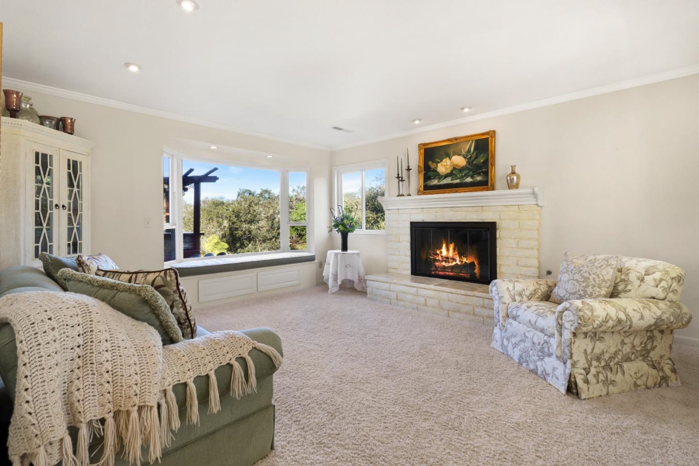17920 Berta Canyon Road Salinas, CA 93907 - Photo 5 of 36 a living room with furniture and a fireplace