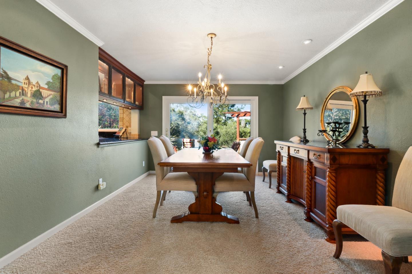 17920 Berta Canyon Road Salinas, CA 93907 - Photo 9 of 36 a view of a dining room with furniture and a chandelier