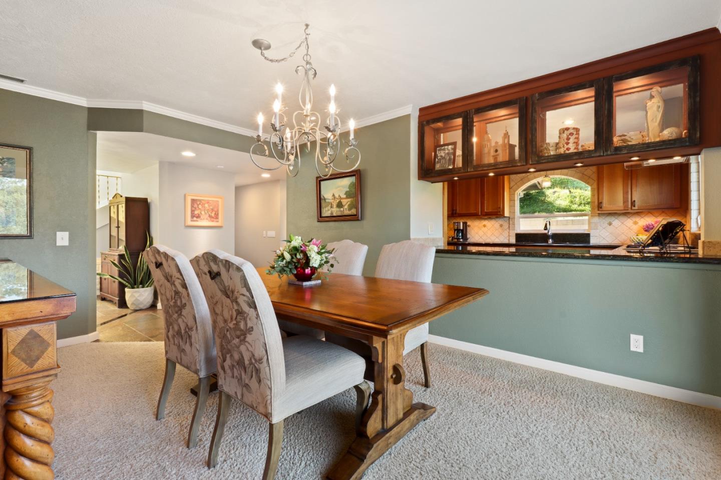 17920 Berta Canyon Road Salinas, CA 93907 - Photo 10 of 36 a view of a dining room with furniture and a chandelier