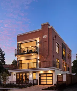 a front view of a building with glass windows