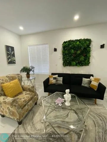 a room with gym equipment and mirror