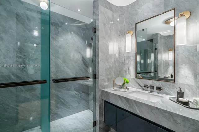 a bathroom with a double vanity sink and a mirror
