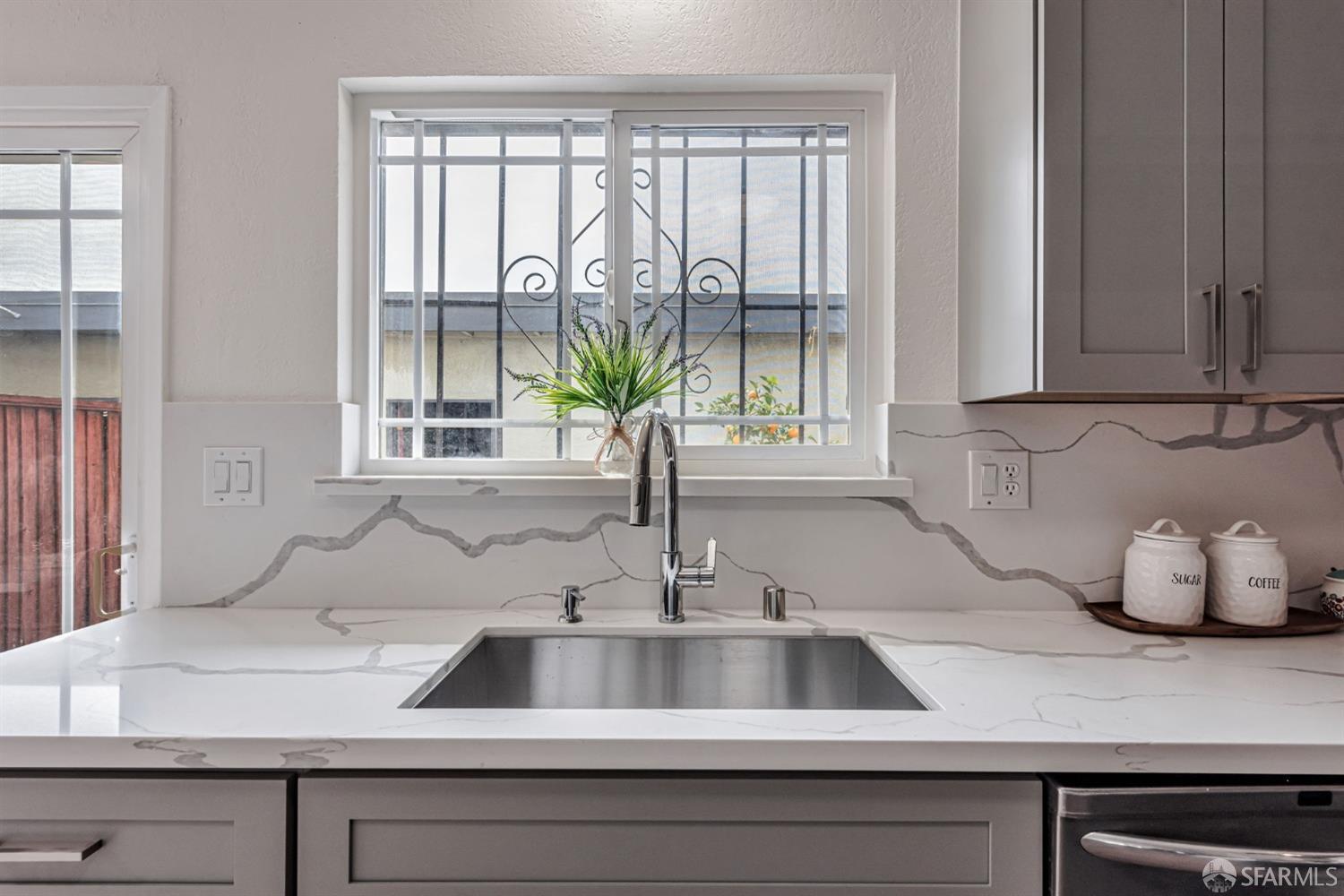 4346 Solano Way Union City, CA 94587 - Photo 12 of 40 a kitchen with a sink and a window