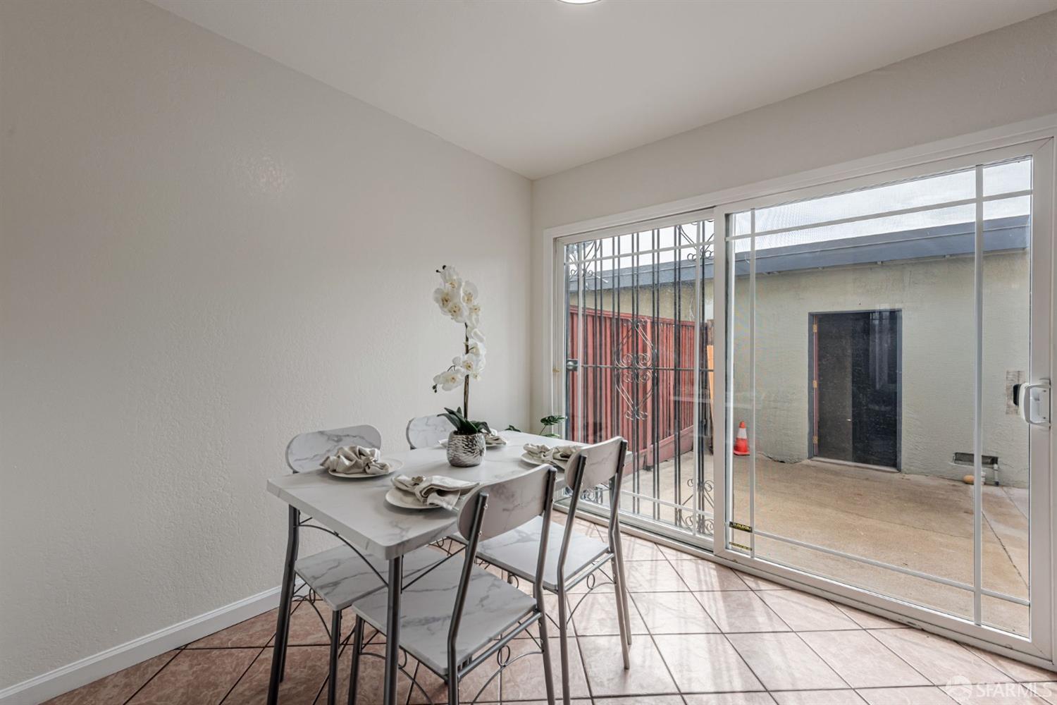 4346 Solano Way Union City, CA 94587 - Photo 15 of 40 a view of a dining room with furniture and chandelier