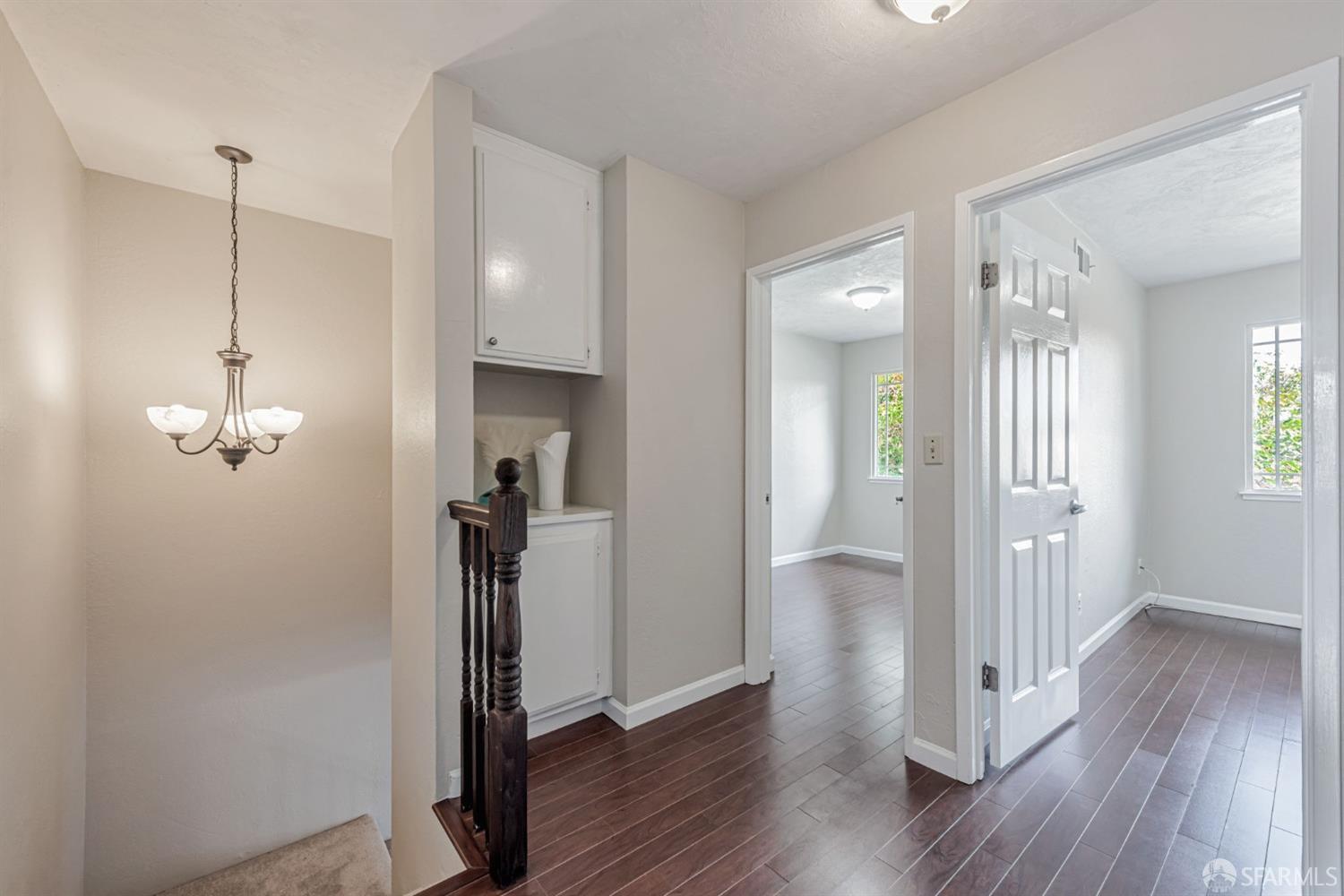4346 Solano Way Union City, CA 94587 - Photo 17 of 40 a view of a room with wooden floor and staircase