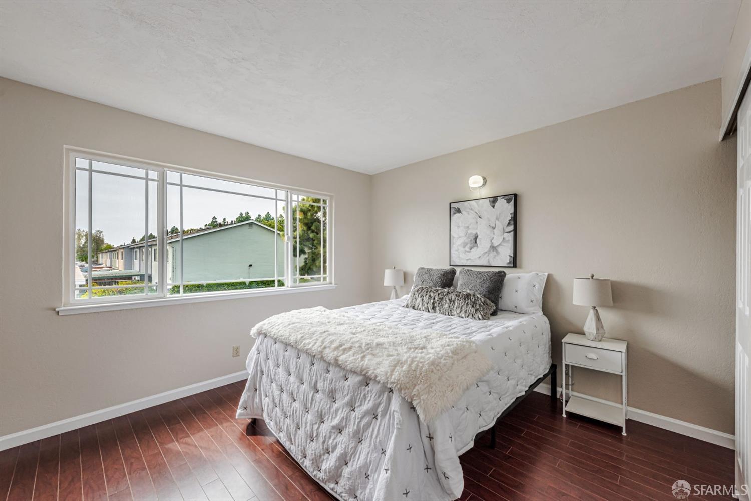 4346 Solano Way Union City, CA 94587 - Photo 19 of 40 a bedroom with a bed and window