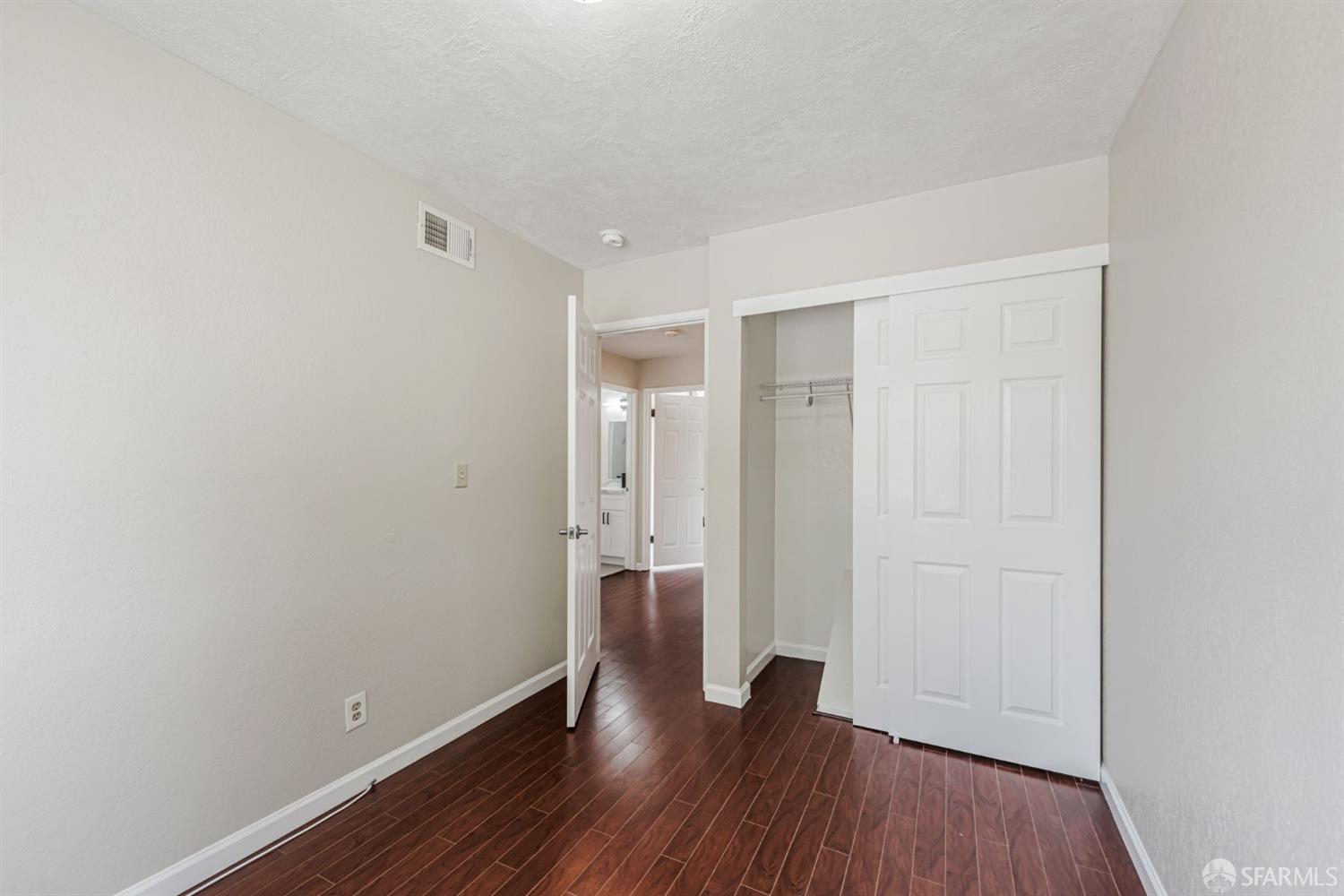4346 Solano Way Union City, CA 94587 - Photo 21 of 40 a view of room with window and wooden floor