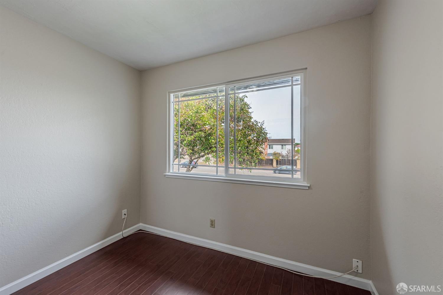 4346 Solano Way Union City, CA 94587 - Photo 24 of 40 a view of a small space with wooden floor and a window