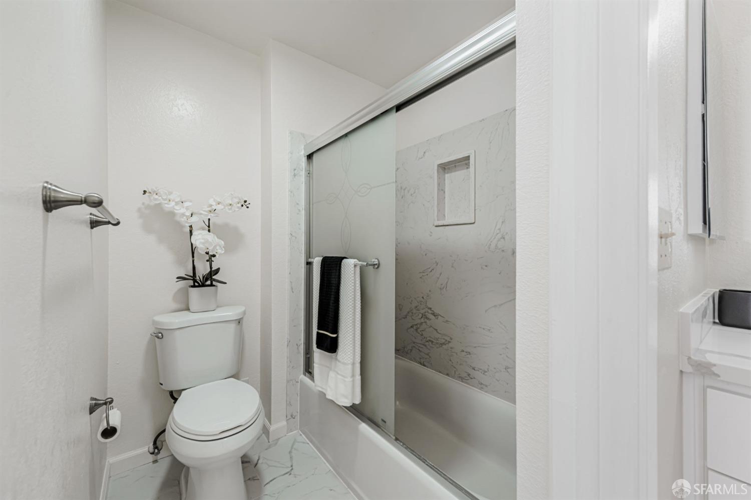 4346 Solano Way Union City, CA 94587 - Photo 28 of 40 a bathroom with a toilet and a shower