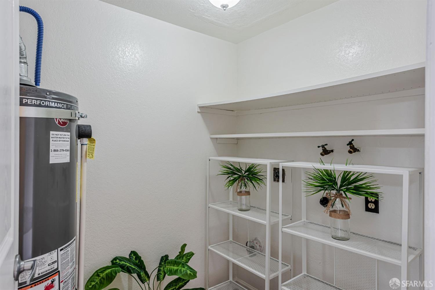 4346 Solano Way Union City, CA 94587 - Photo 30 of 40 a view of bathroom with a potted plant on the counter and a window
