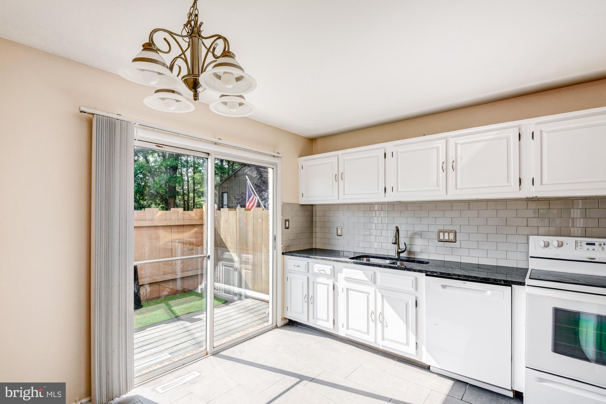 73 Wedge Lane Reading, PA 19607 - Photo 6 of 23 Bright kitchen with outdoor access.