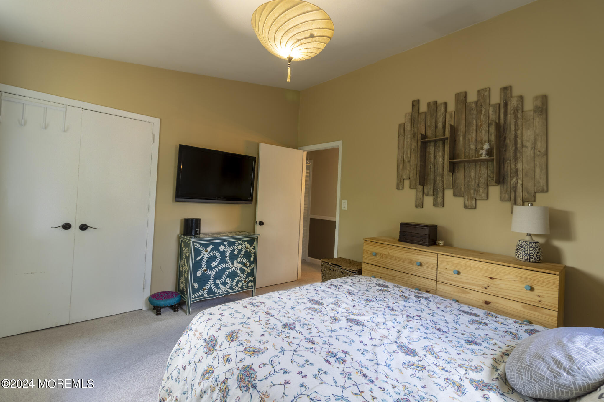448 Cornell Drive Brick, NJ 08723 - Photo 12 of 28 a bedroom with a bed and a flat tv screen on dresser