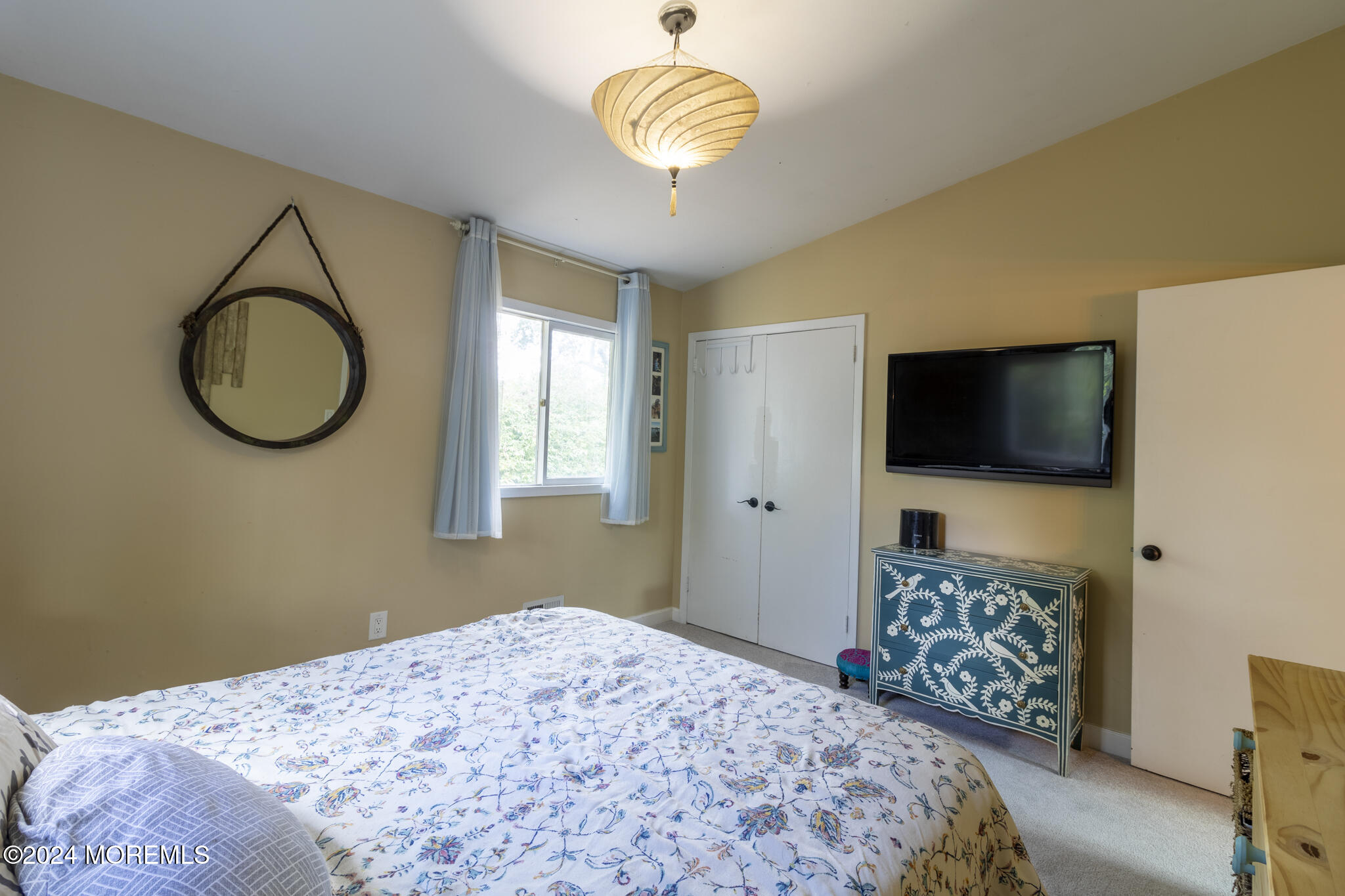 448 Cornell Drive Brick, NJ 08723 - Photo 13 of 28 a bedroom with a bed and a flat screen tv