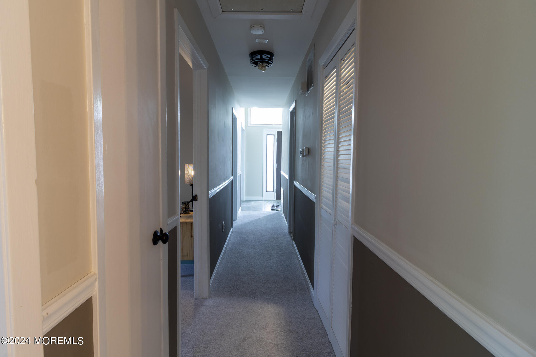 448 Cornell Drive Brick, NJ 08723 - Photo 17 of 28 a view of hallway with stairs