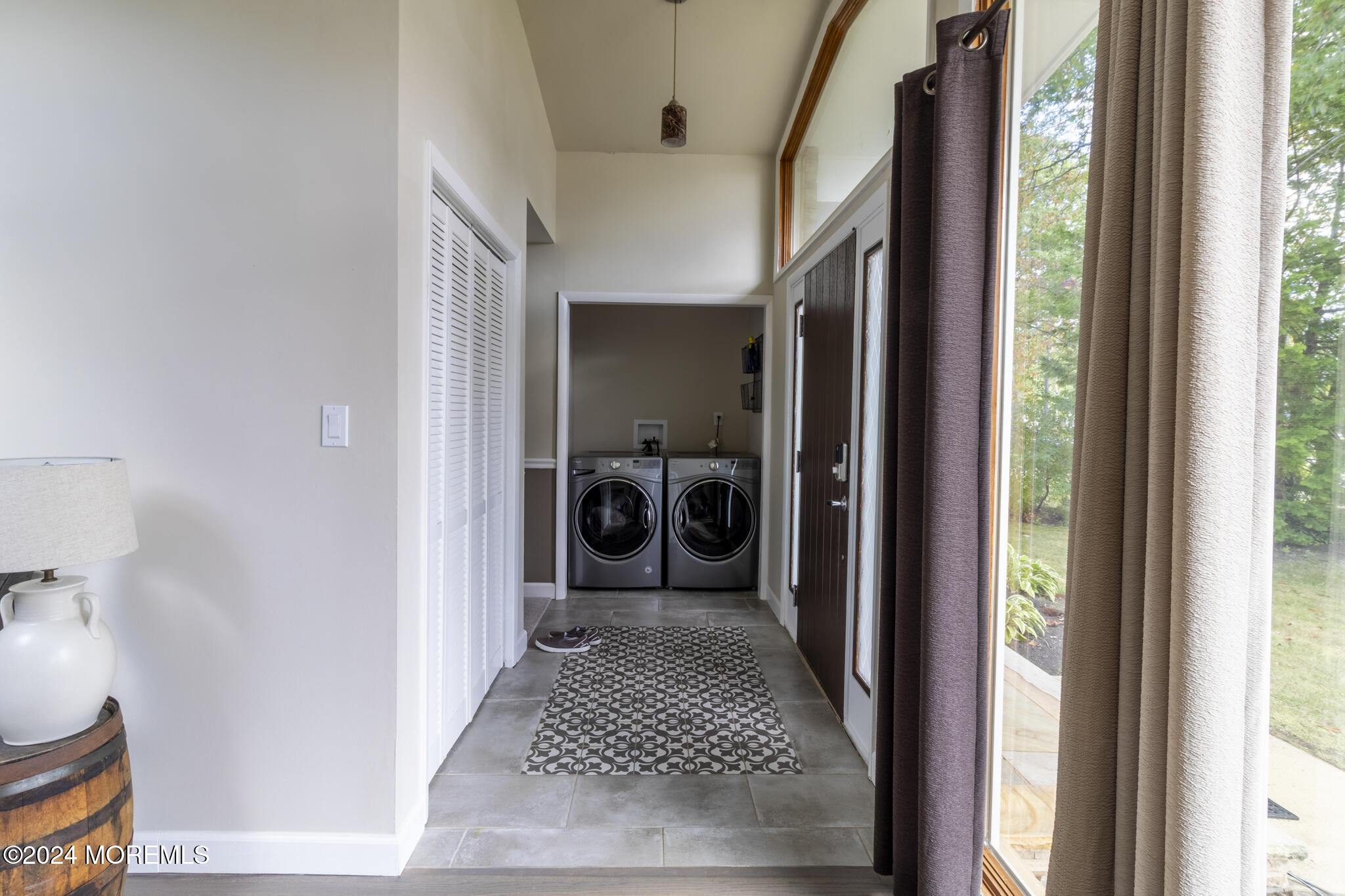 448 Cornell Drive Brick, NJ 08723 - Photo 18 of 28 a view of a hallway with a livingroom and furniture