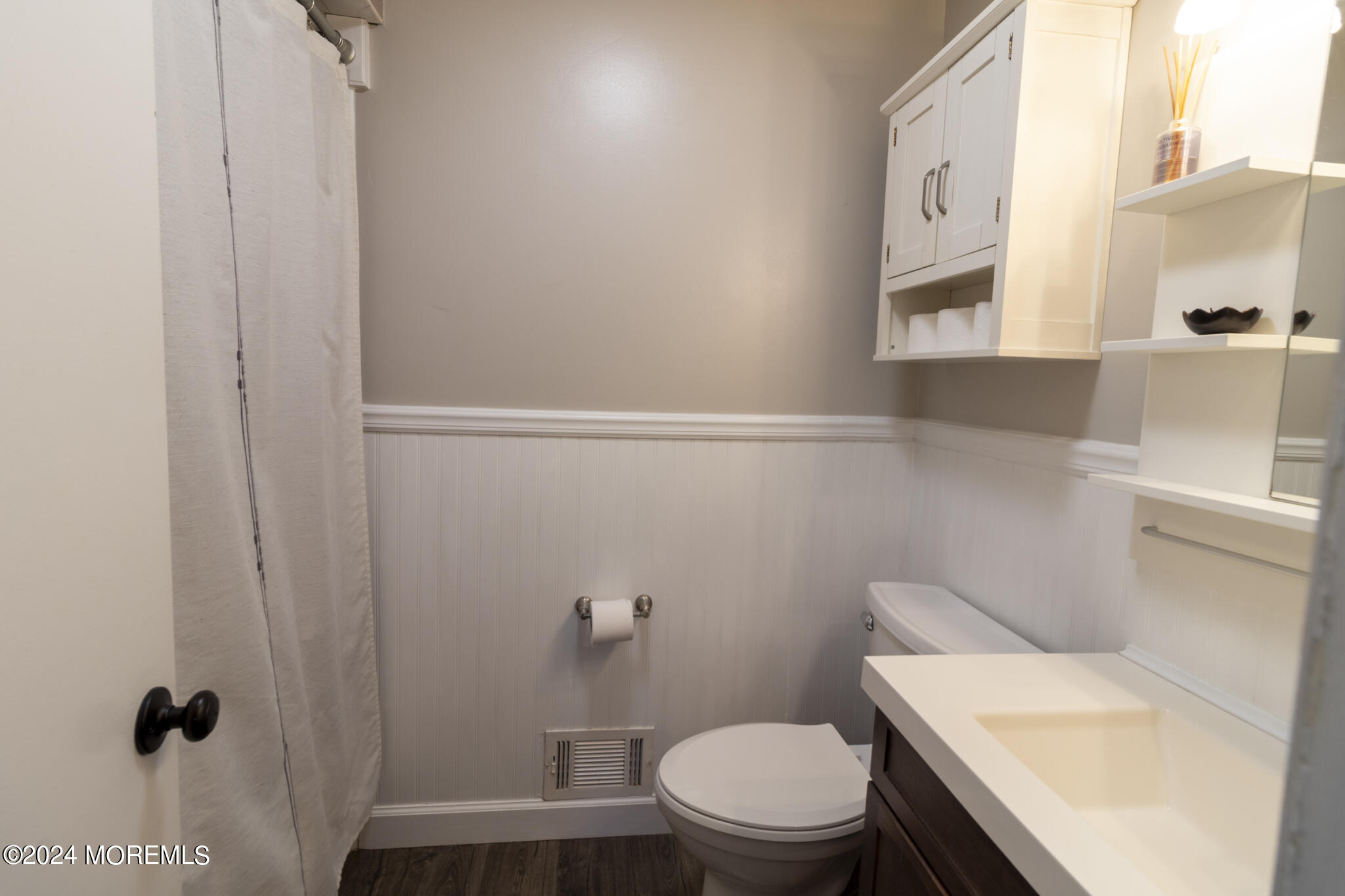 448 Cornell Drive Brick, NJ 08723 - Photo 19 of 28 a white toilet sitting next to a bathroom sink