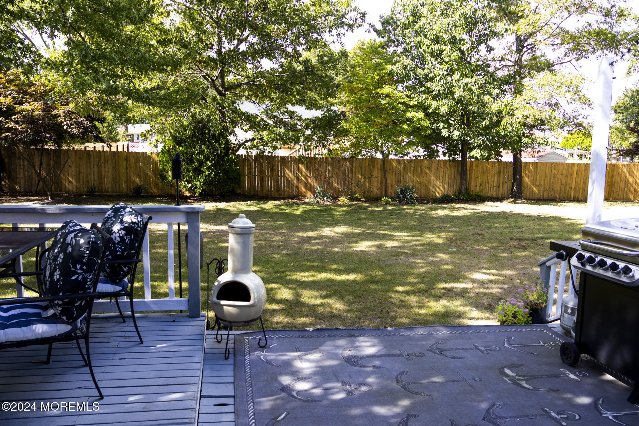 448 Cornell Drive Brick, NJ 08723 - Photo 20 of 28 a view of a backyard with chairs