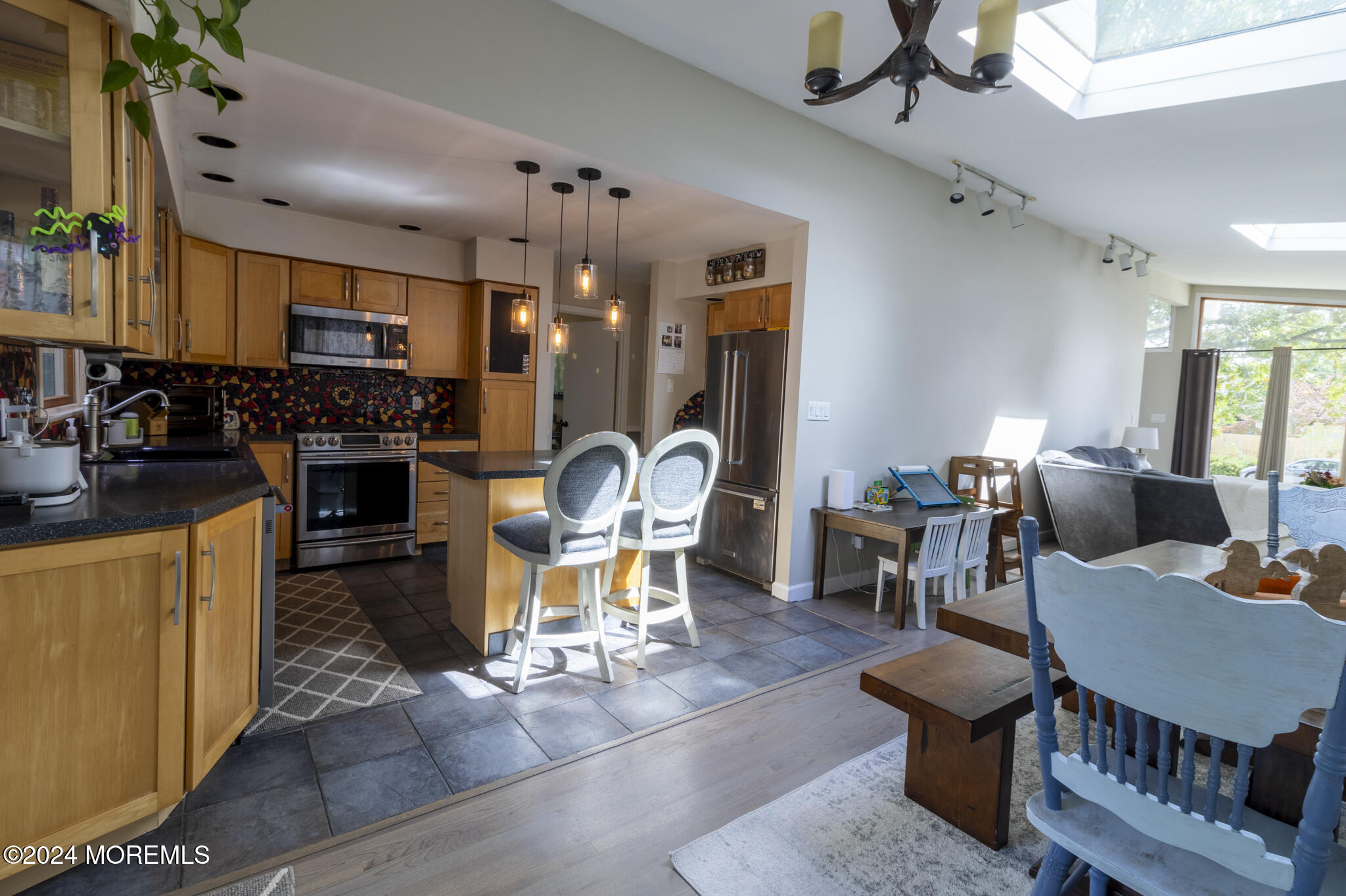 448 Cornell Drive Brick, NJ 08723 - Photo 5 of 28 a view of a dining room with furniture