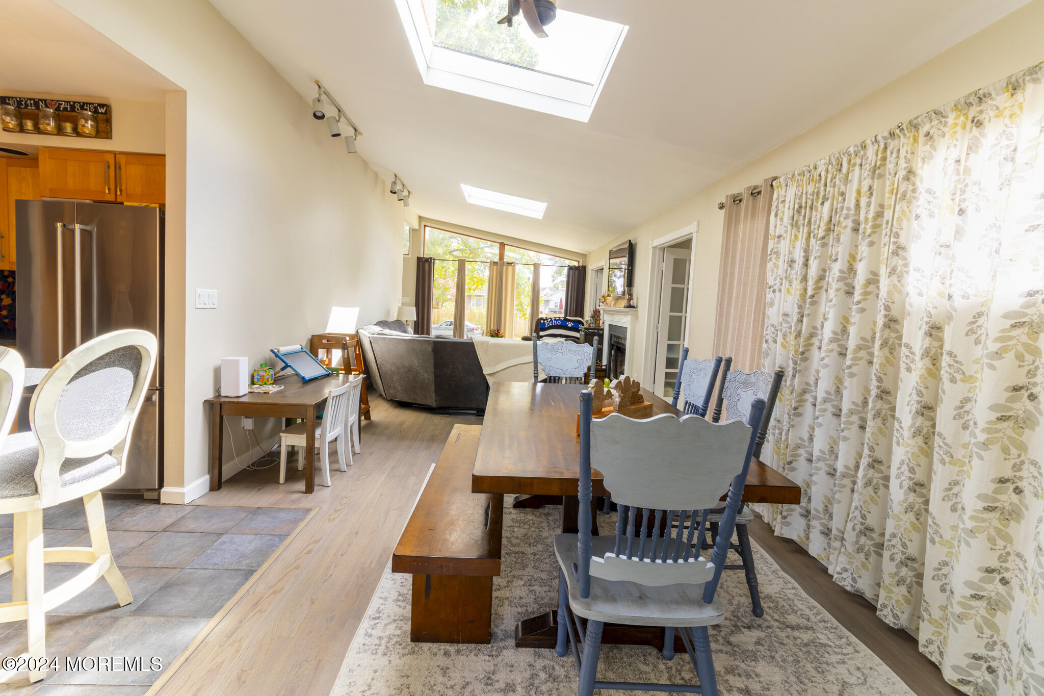 448 Cornell Drive Brick, NJ 08723 - Photo 6 of 28 a view of a dining room with furniture window and wooden floor