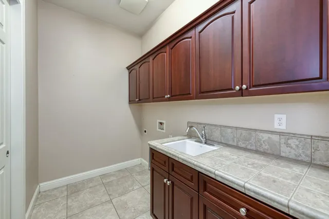 a view of cabinets with sink