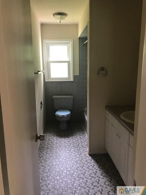 22 Jean Road East Brunswick, NJ 08816 - Photo 8 of 18 a bathroom with a sink and a toilet