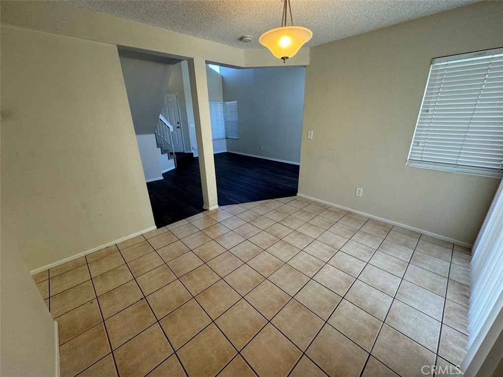 13080 Mohican Drive Moreno Valley, CA 92555 - Photo 12 of 38 a bedroom with a bed and a mirror