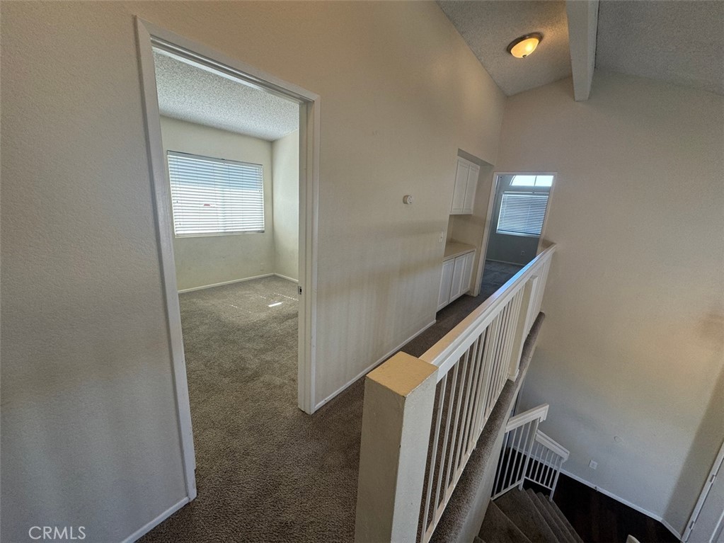 13080 Mohican Drive Moreno Valley, CA 92555 - Photo 22 of 38 a view of hallway with stairs