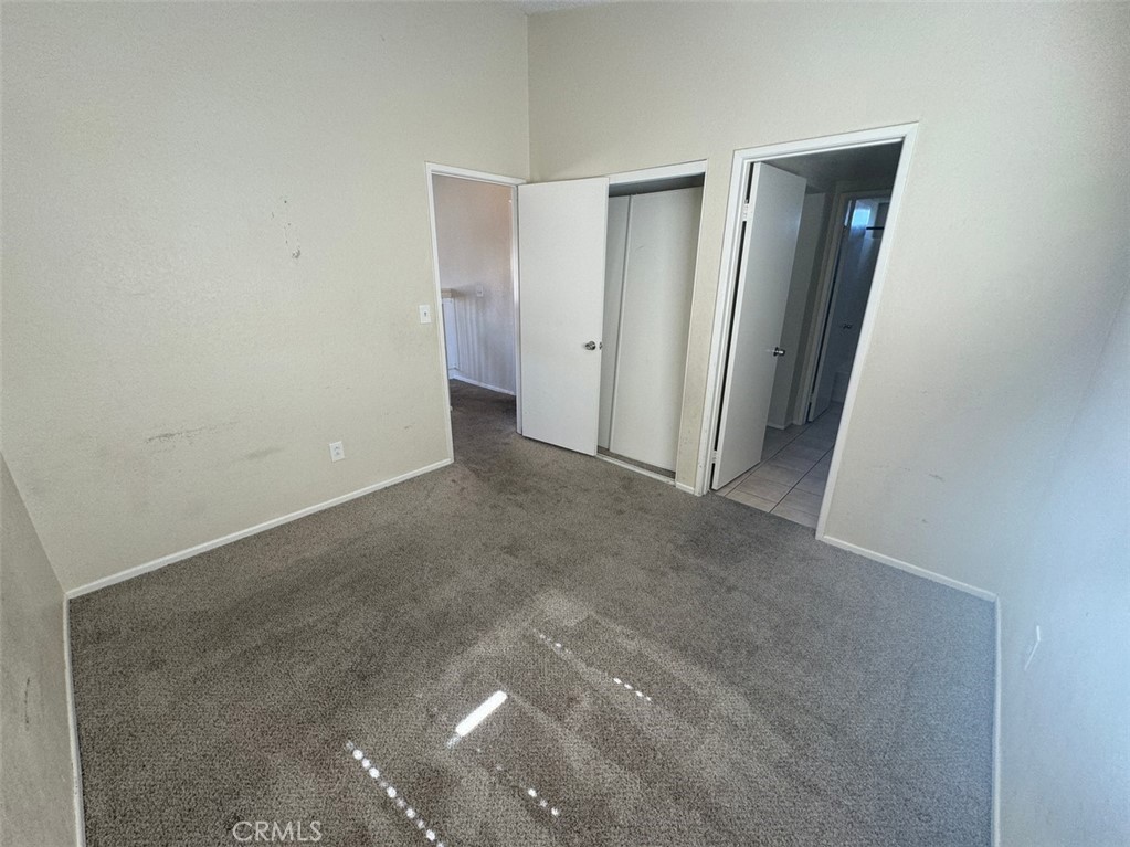 13080 Mohican Drive Moreno Valley, CA 92555 - Photo 30 of 38 a view of an empty room with closet area