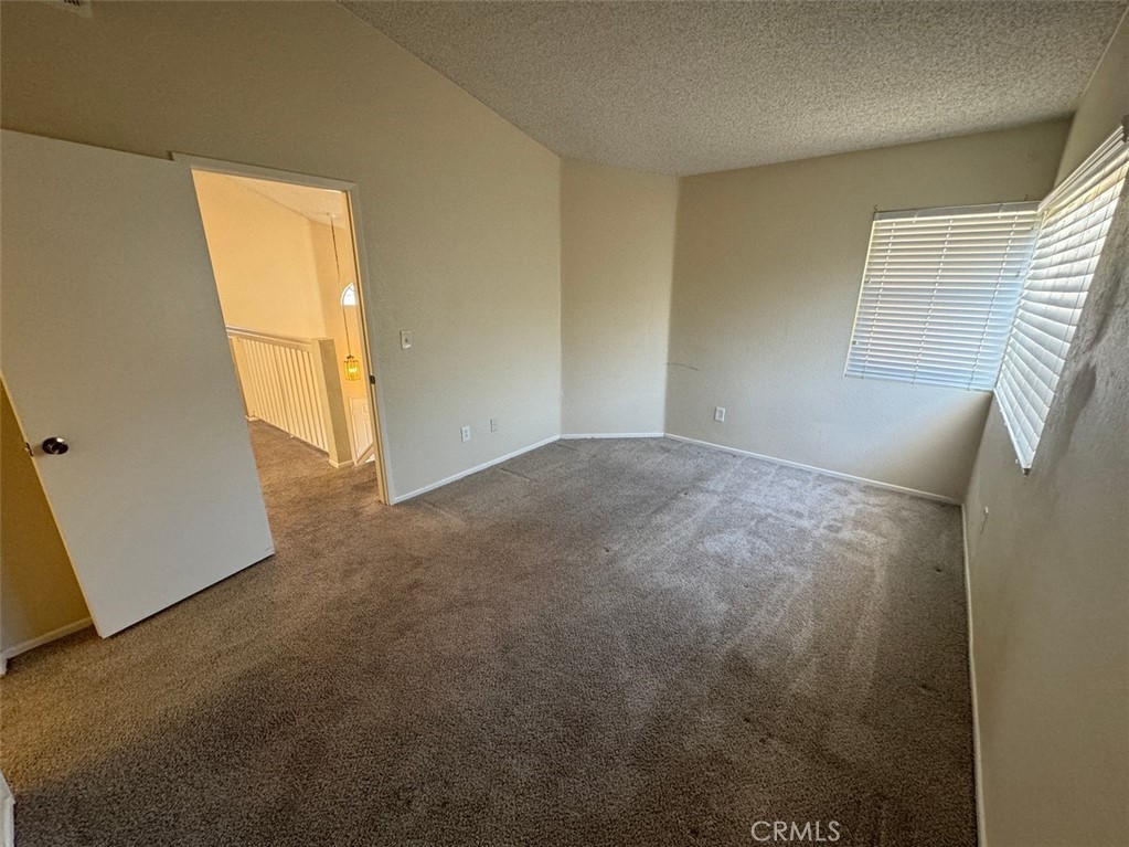 13080 Mohican Drive Moreno Valley, CA 92555 - Photo 35 of 38 a view of an empty room and a window