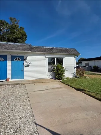 a view of garage and yard